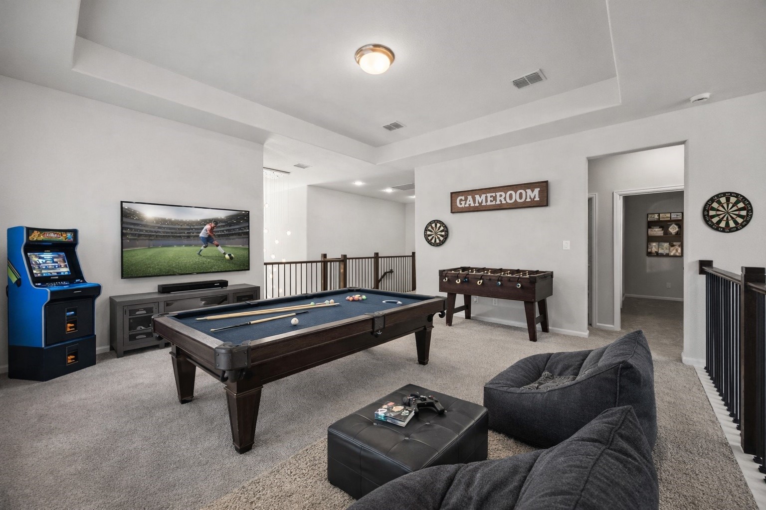 154 Amaranth Way Richmond, TX 77406 - Photo 27 of 37 a living room with furniture and a flat screen tv