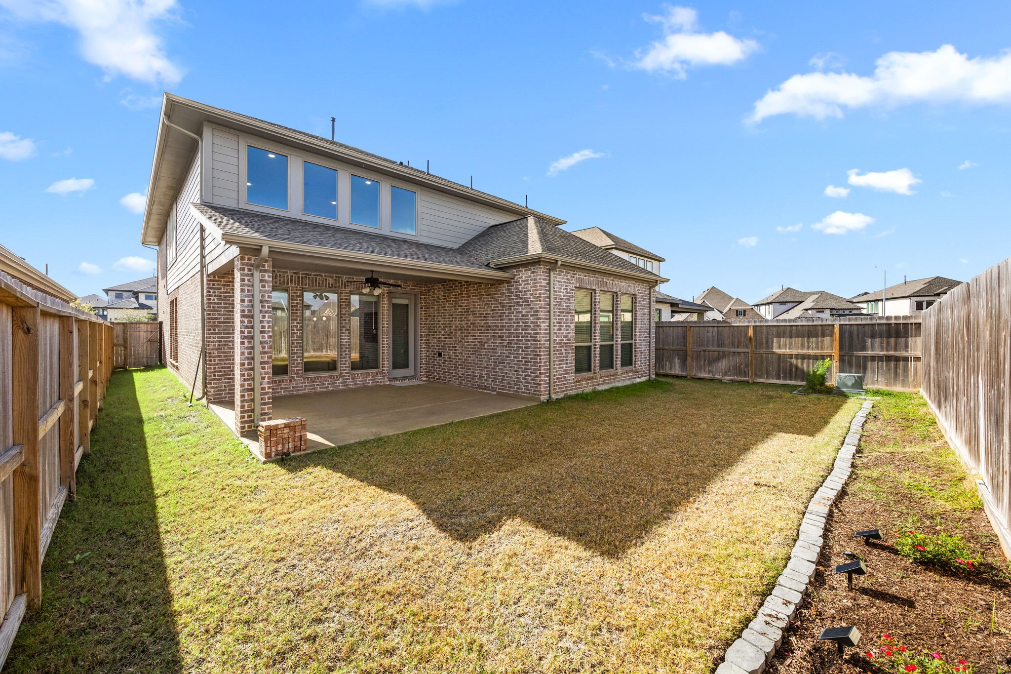 154 Amaranth Way Richmond, TX 77406 - Photo 36 of 37 a view of a house with a swimming pool