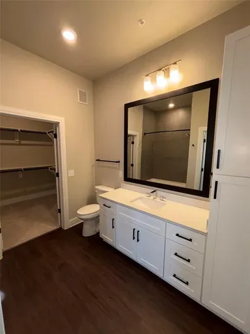 a view of an empty walk in closet