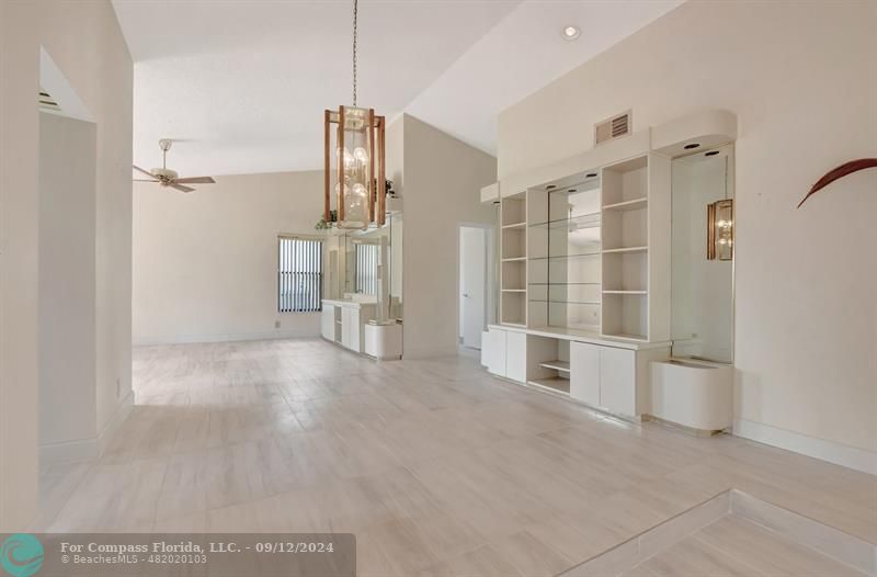 9477 Burlington Place Boca Raton, FL 33434 - Photo 12 of 40 a view of empty room with a kitchen