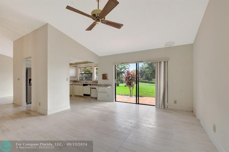 9477 Burlington Place Boca Raton, FL 33434 - Photo 20 of 40 a living room with furniture and a large window