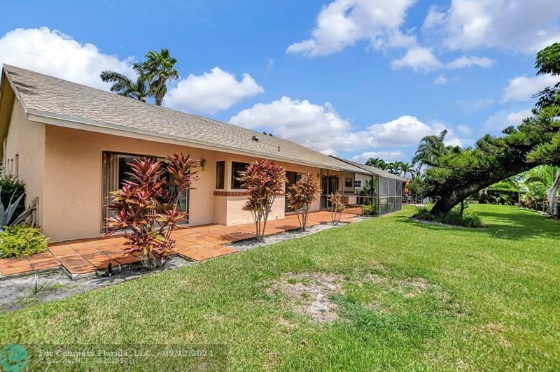 9477 Burlington Place Boca Raton, FL 33434 - Photo 32 of 40 a view of a porch yard