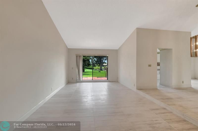 9477 Burlington Place Boca Raton, FL 33434 - Photo 9 of 40 a view of an empty room with a window
