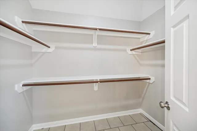 a view of an empty walk in closet