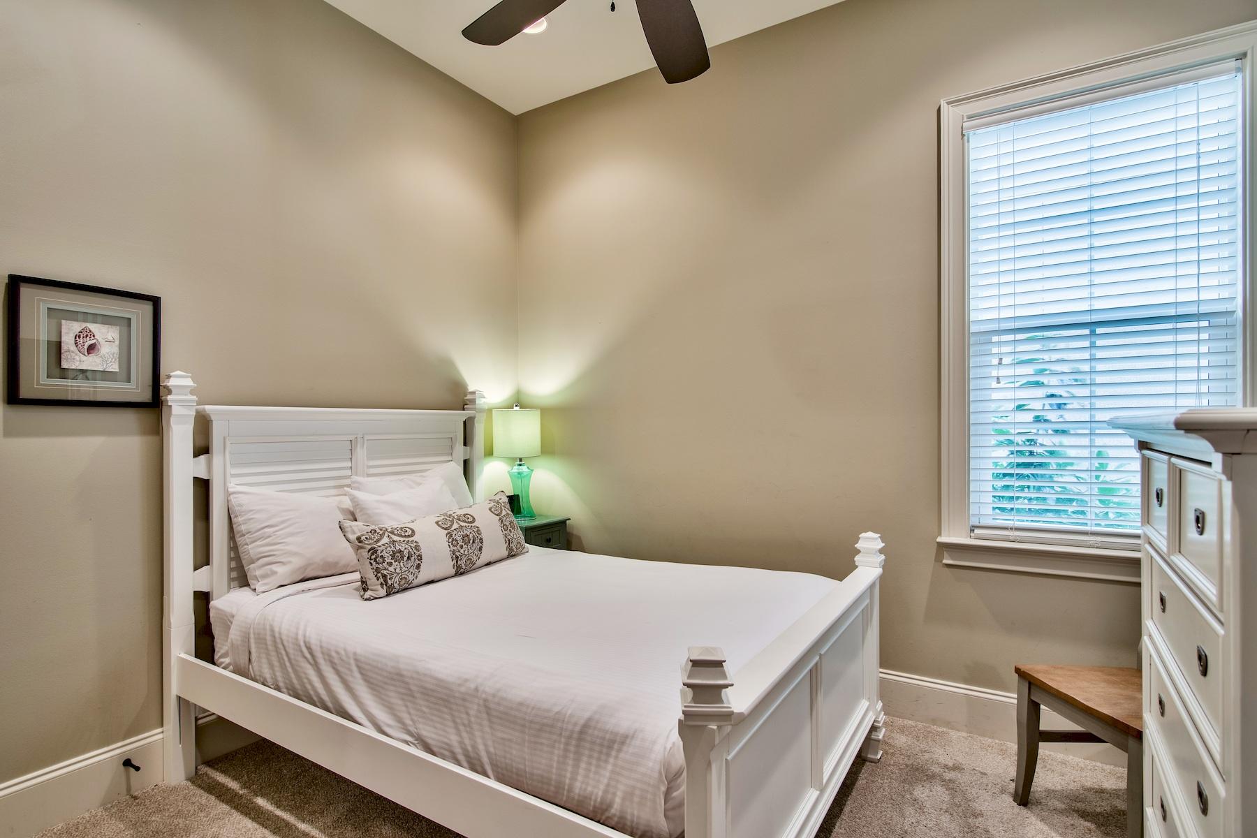 1973 Baytowne Loop Miramar Beach, FL 32550 - Photo 20 of 40 a bedroom with a bed and a window