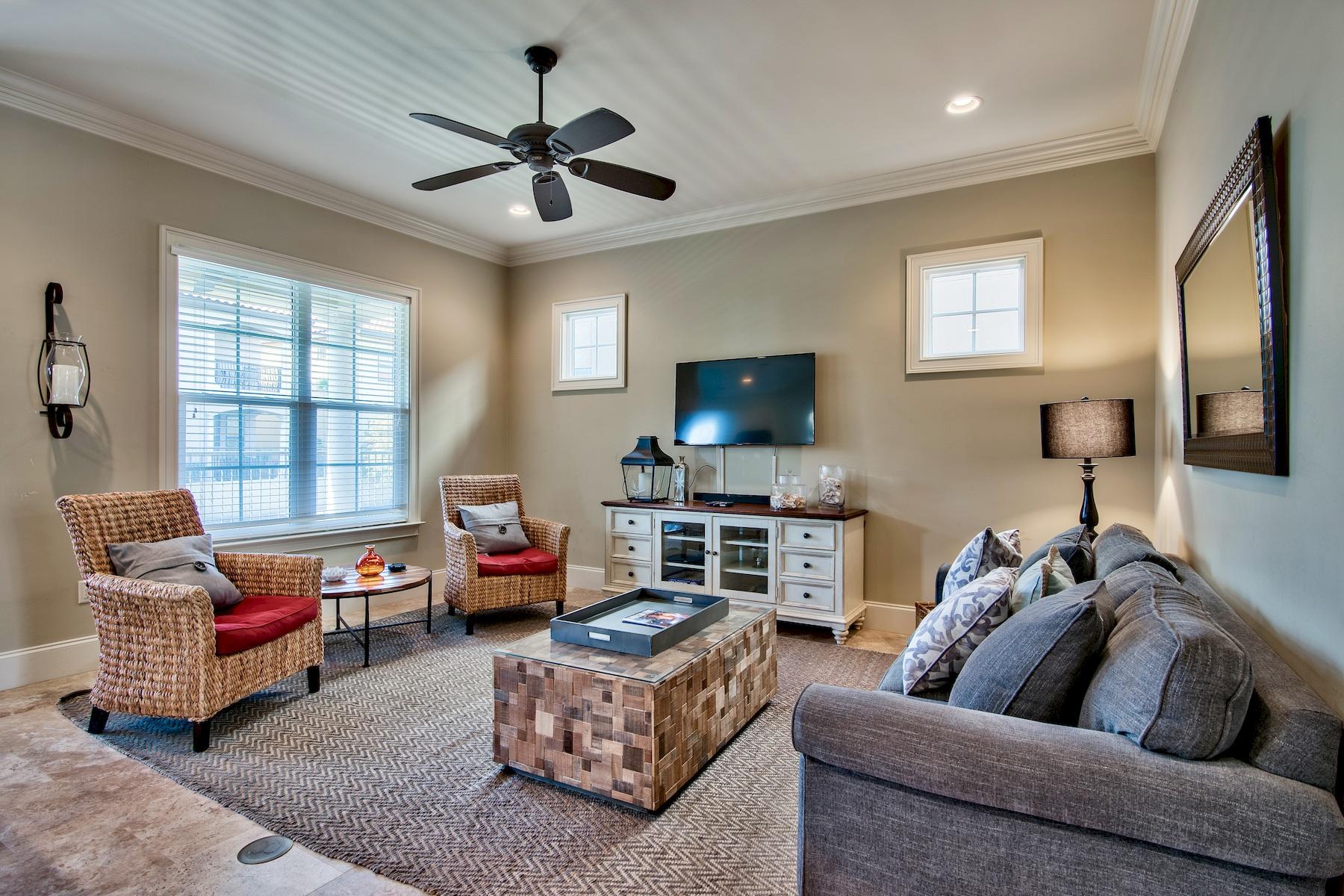 1973 Baytowne Loop Miramar Beach, FL 32550 - Photo 2 of 40 a living room with furniture and a flat screen tv