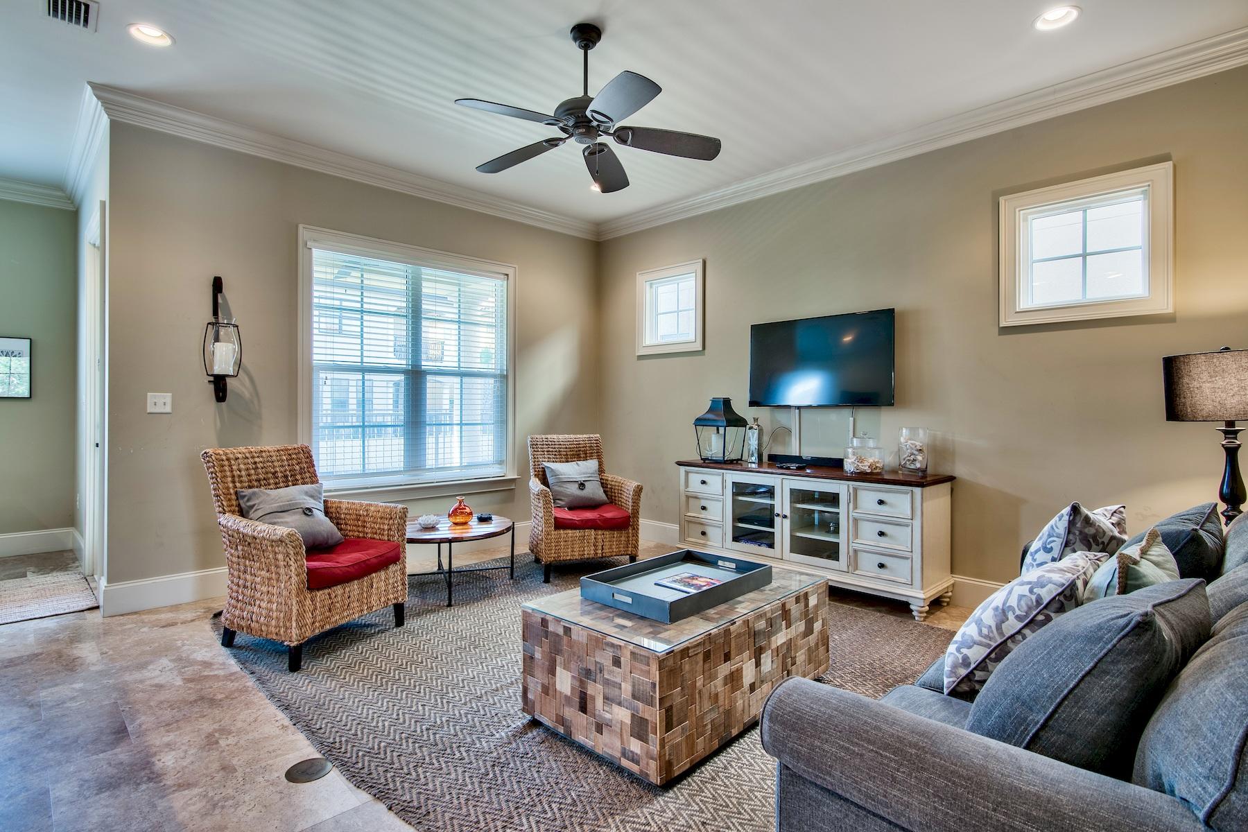 1973 Baytowne Loop Miramar Beach, FL 32550 - Photo 3 of 40 a living room with furniture and a flat screen tv