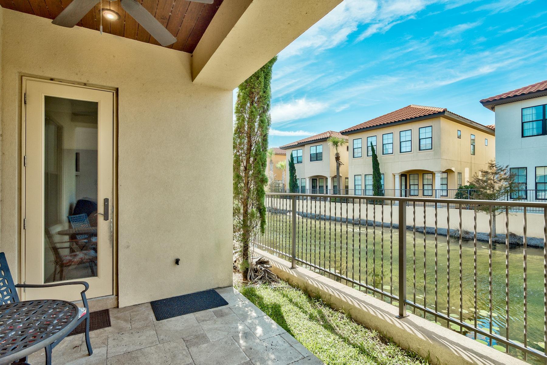1973 Baytowne Loop Miramar Beach, FL 32550 - Photo 31 of 40 a view of a brick house with a small yard