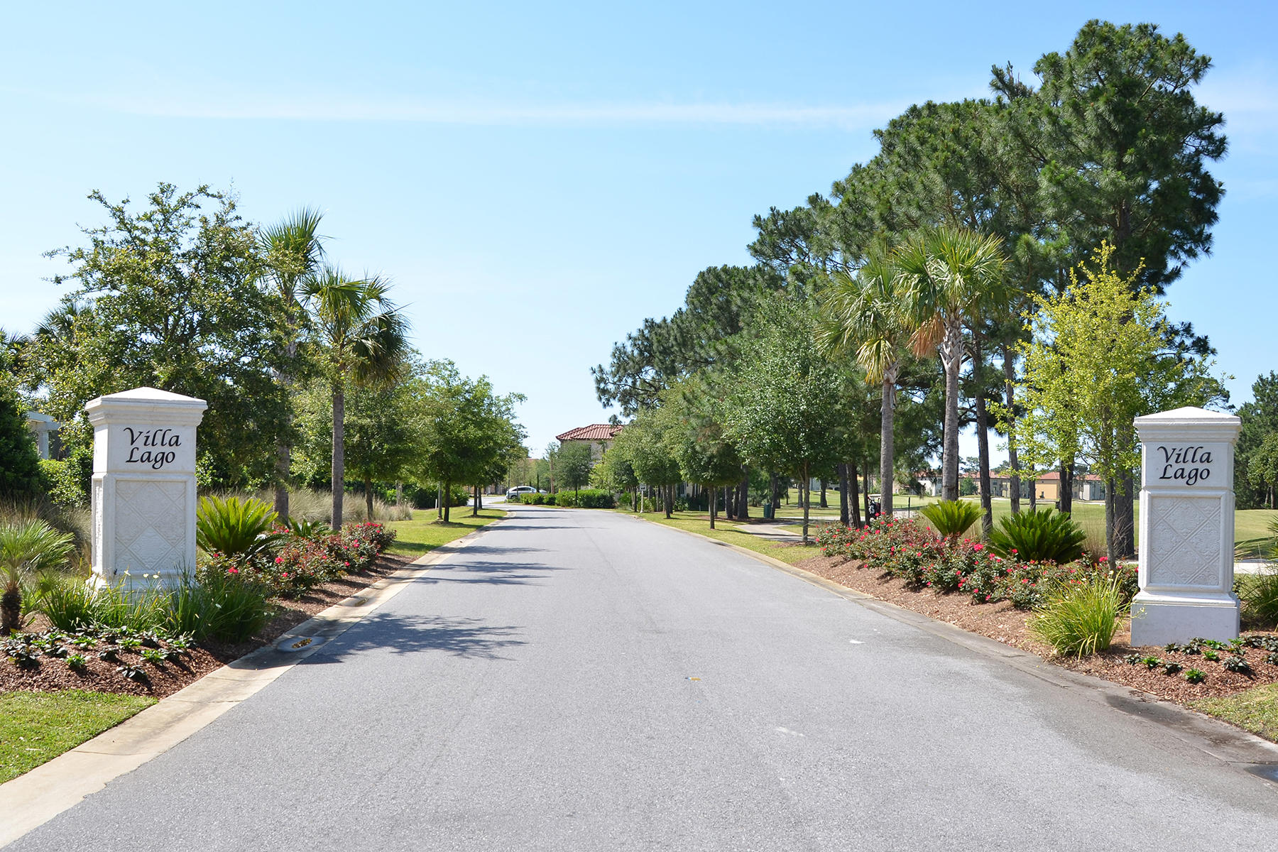 1973 Baytowne Loop Miramar Beach, FL 32550 - Photo 34 of 40 a row of palm trees and a fire pit