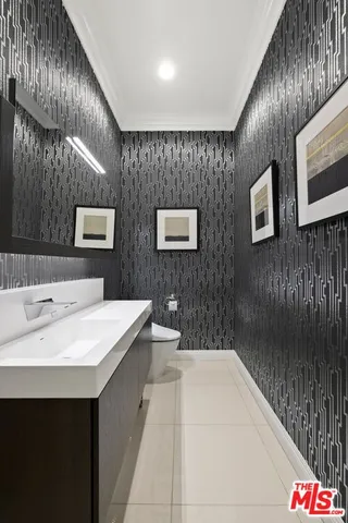 a bedroom with a bed and a table in it