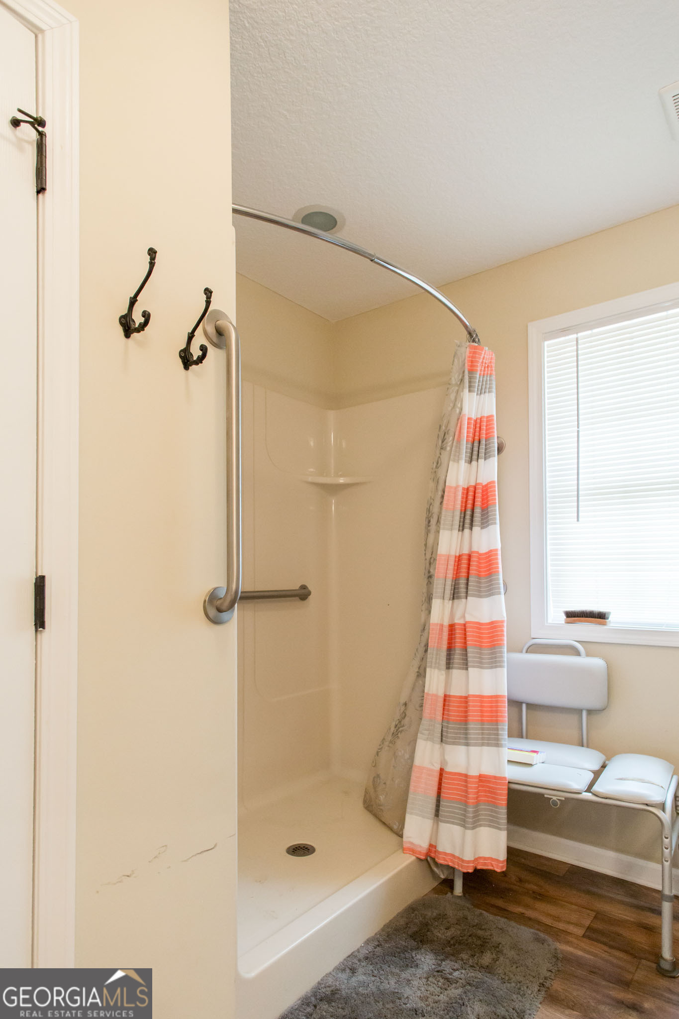 920 Wilfred Street Waycross, GA 31503 - Photo 16 of 17 a bathroom with a shower and a window