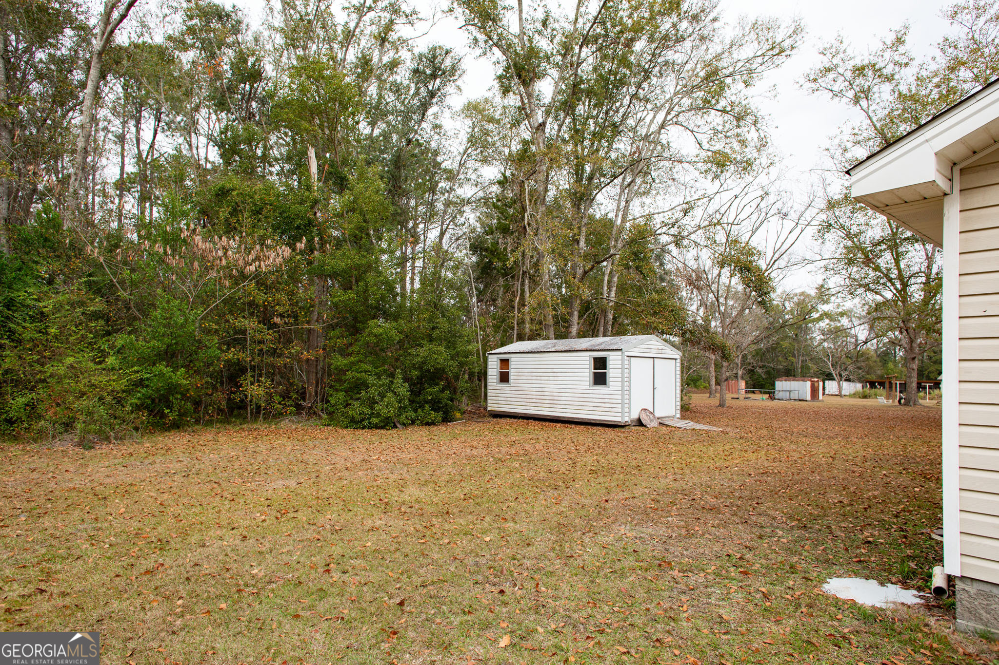 920 Wilfred Street Waycross, GA 31503 - Photo 4 of 17 a view of a field with a tree