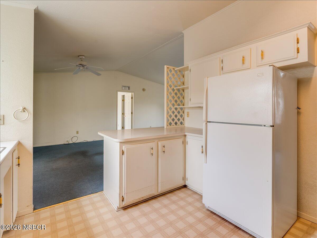 926 Vista Del Rio Santa Maria, CA 93458 - Photo 10 of 24 11-926-Vista-Del-Rio-Kitchen-to-Living-R