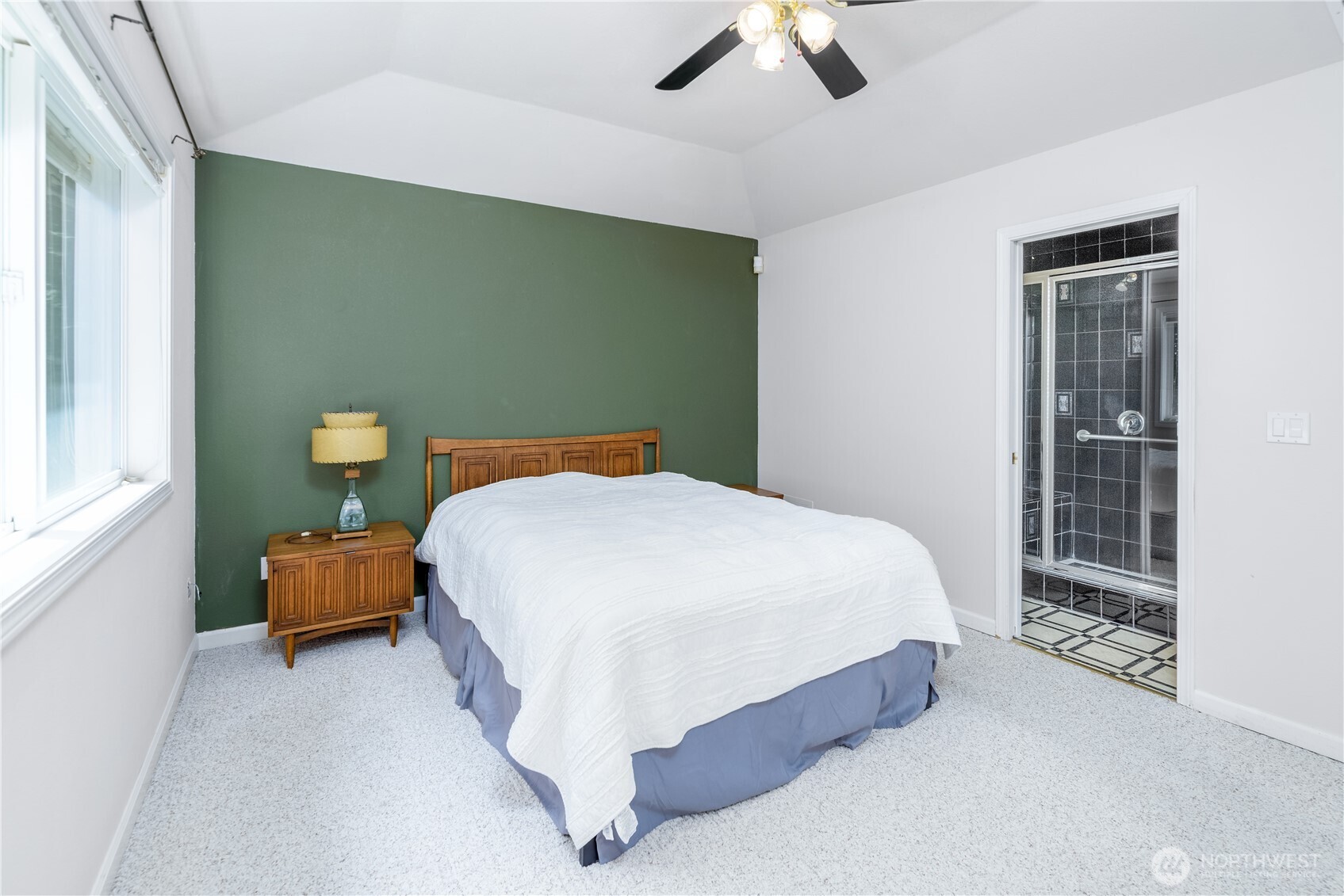301 Mt Pleasant Estates Road Port Angeles, WA 98362 - Photo 16 of 40 a bedroom with a bed and window