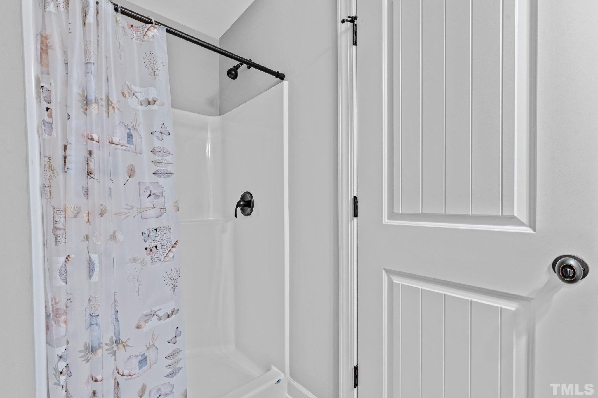 97 Thunder Ridge Drive Garner, NC 27529 - Photo 28 of 33 a bathroom with a shower