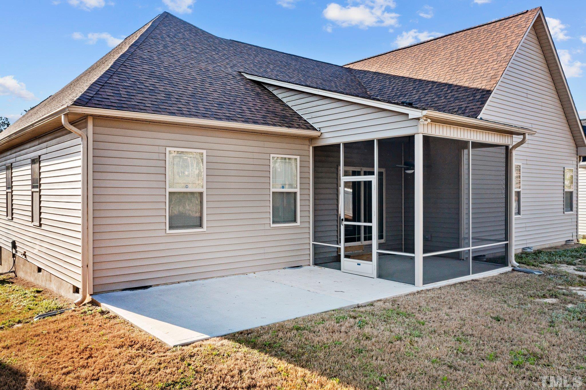 97 Thunder Ridge Drive Garner, NC 27529 - Photo 30 of 33 a front view of a house with a yard