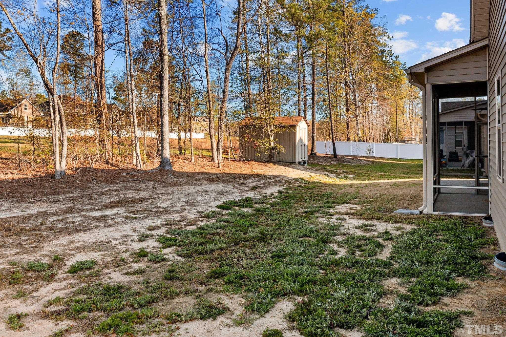 97 Thunder Ridge Drive Garner, NC 27529 - Photo 31 of 33 a view of a yard in front of a building
