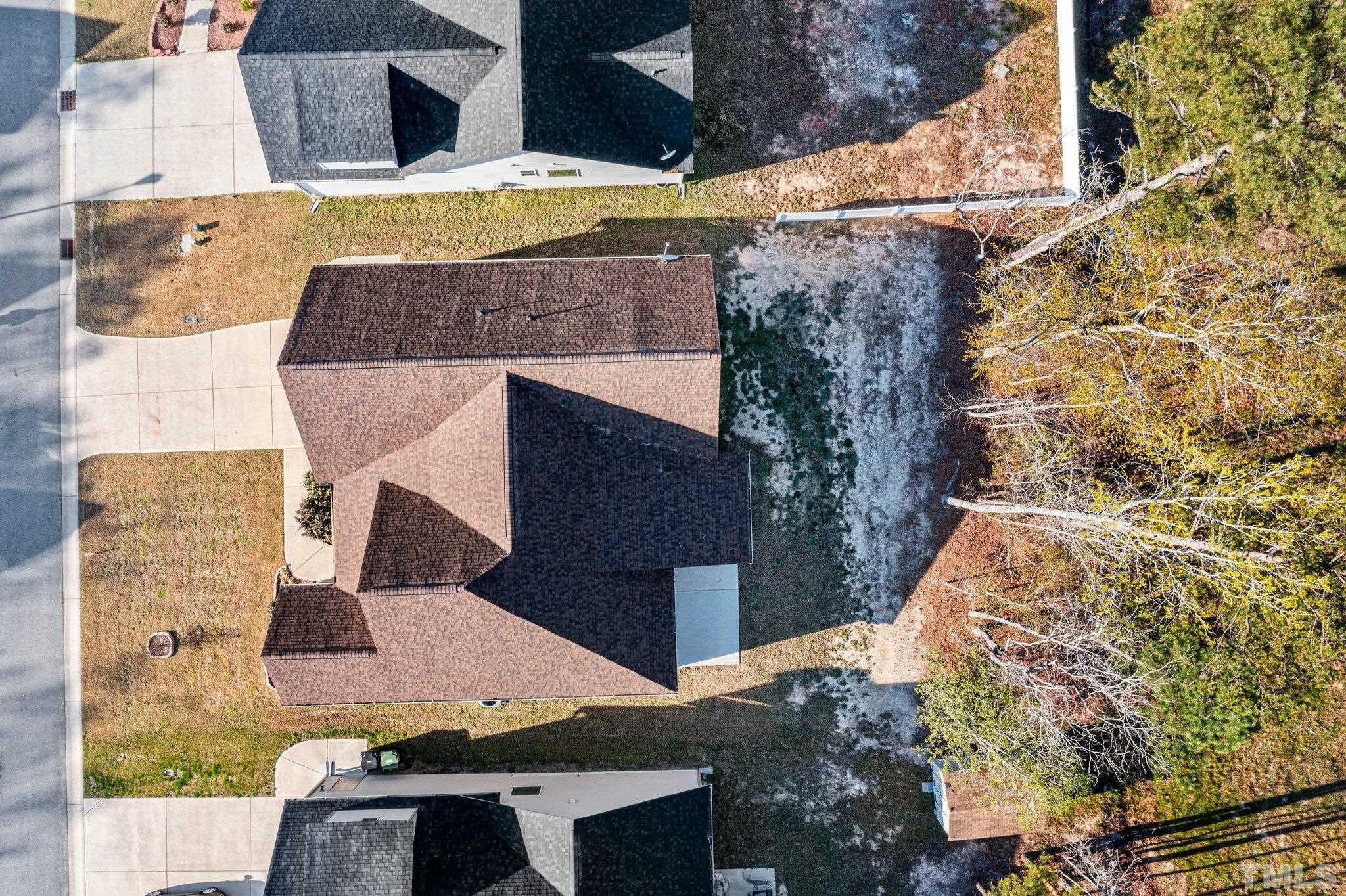 97 Thunder Ridge Drive Garner, NC 27529 - Photo 32 of 33 a aerial view of a house with a yard