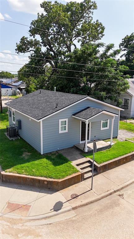 3113 Navaro Street Dallas, TX 75212 - Photo 11 of 12 a view of a house with a yard and large tree