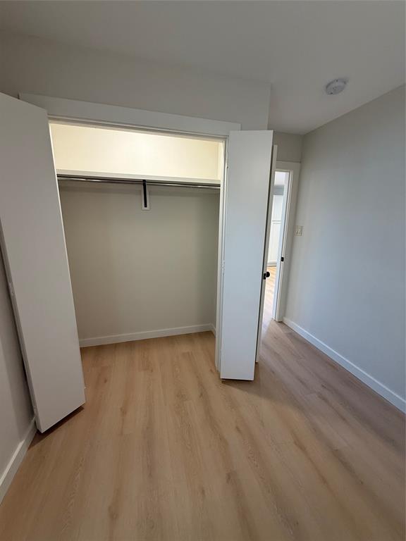 3113 Navaro Street Dallas, TX 75212 - Photo 5 of 12 a view of a room with wooden floor