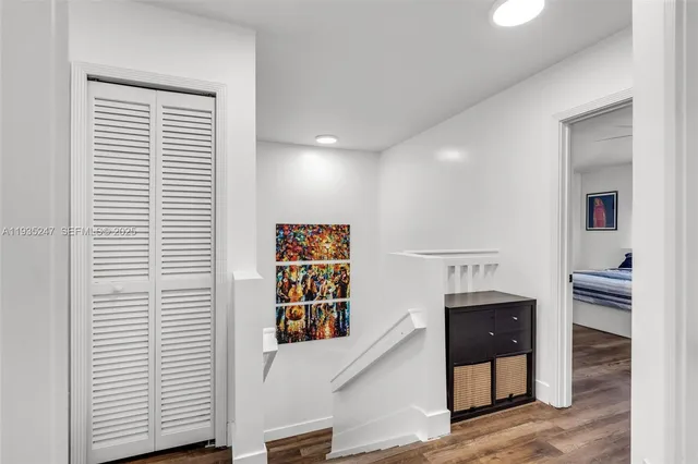 a view of cabinets and window