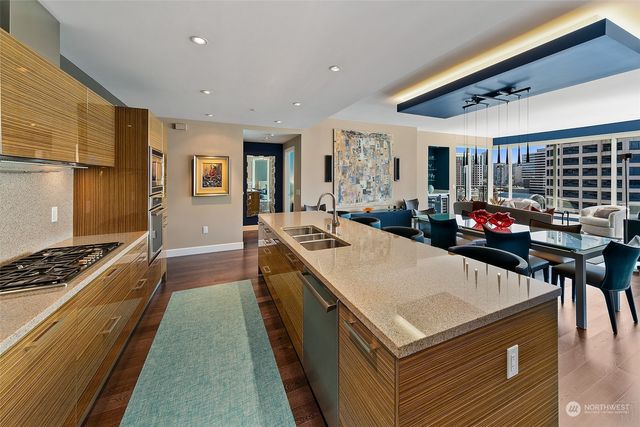 a very nice looking kitchen with a large window