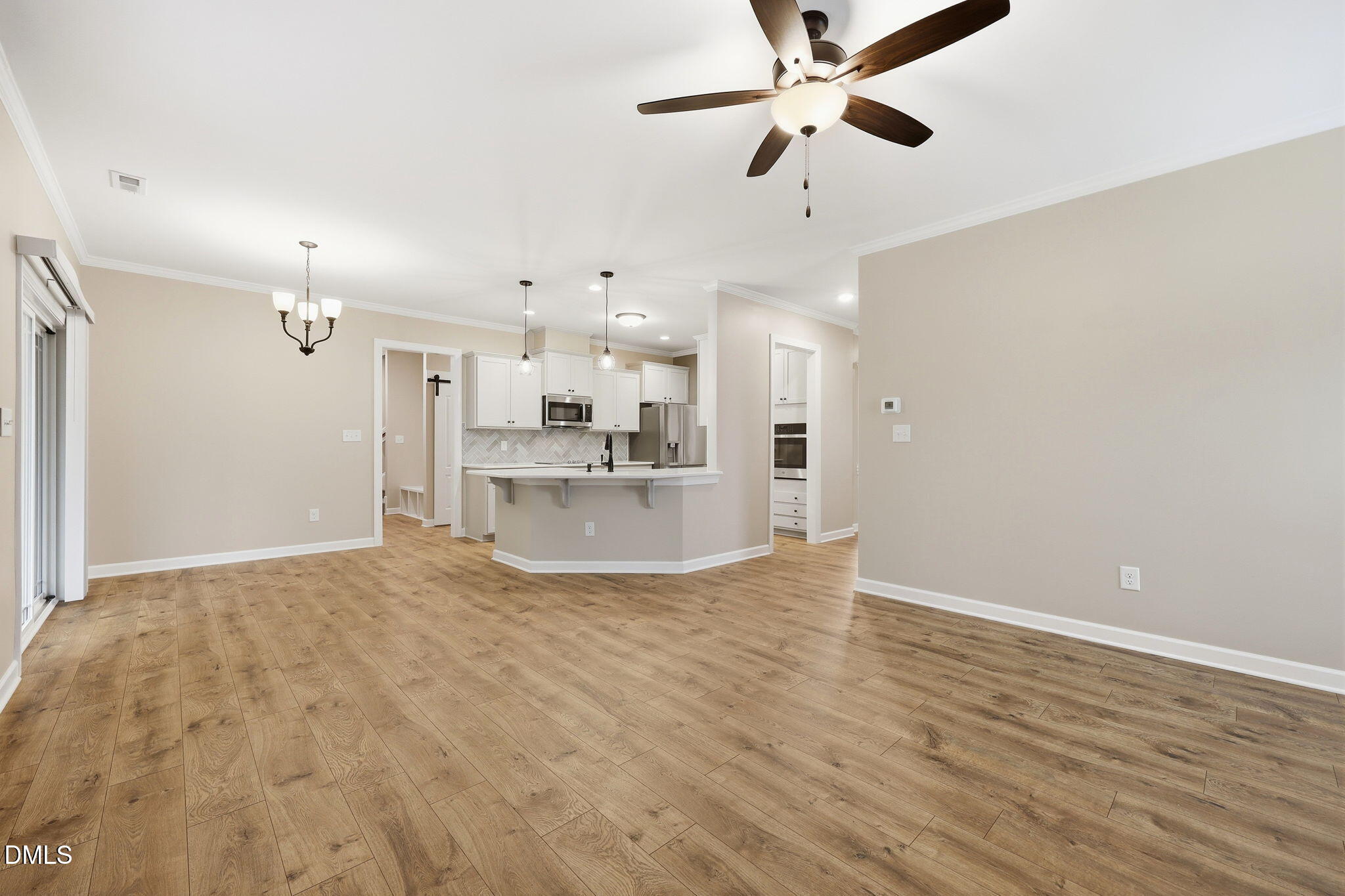 146 Seahawk Way Zebulon, NC 27597 - Photo 15 of 51 a view of a kitchen with a sink and a refrigerator