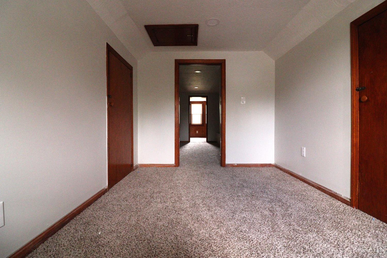 4731 Shephard Road Batavia, OH 45103 - Photo 21 of 25 Cape Cod style upper 1/2 story. Great space as 3rd bedroom, playroom or family room. Space is divided into 3 rooms. This is view from the stairs.