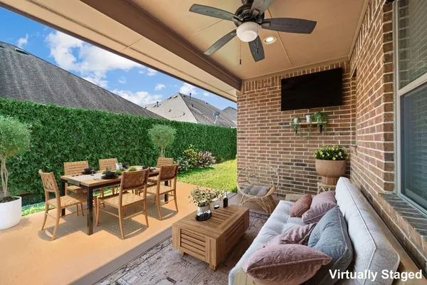 a building outdoor space with patio furniture