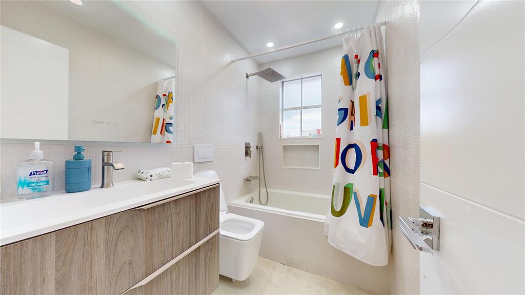 4060 Southwest 70th Terrace Davie, FL 33314 - Photo 12 of 22 a bathroom with a sink vanity granite and toilet