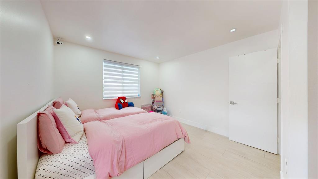 4060 Southwest 70th Terrace Davie, FL 33314 - Photo 17 of 22 a living room with a bed and a window