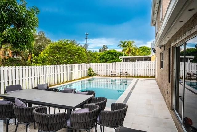 4060 Southwest 70th Terrace Davie, FL 33314 - Photo 21 of 22 a balcony with table and chairs