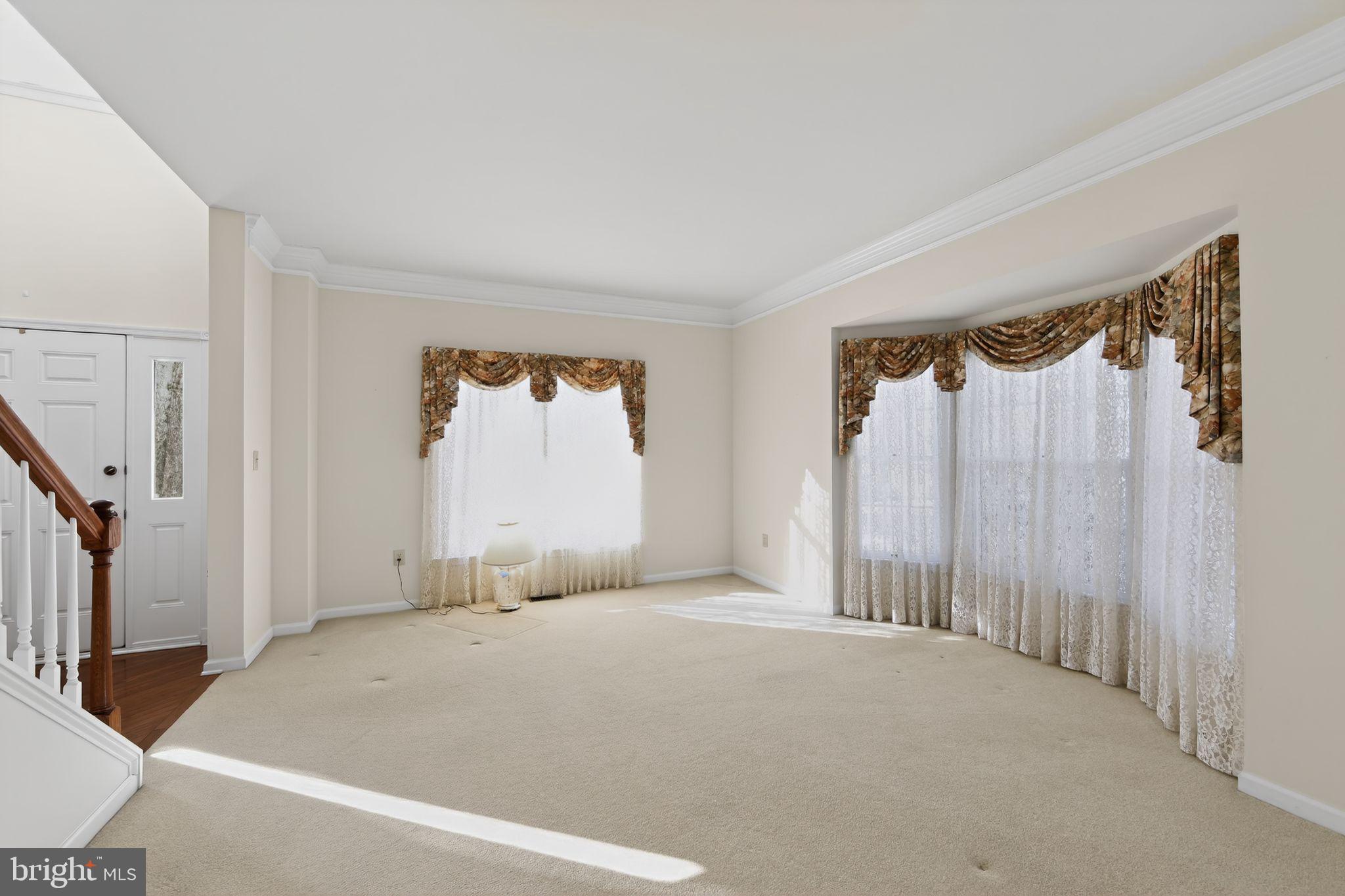 221 Cullen Way Newark, DE 19711 - Photo 11 of 37 a view of an empty room with a window