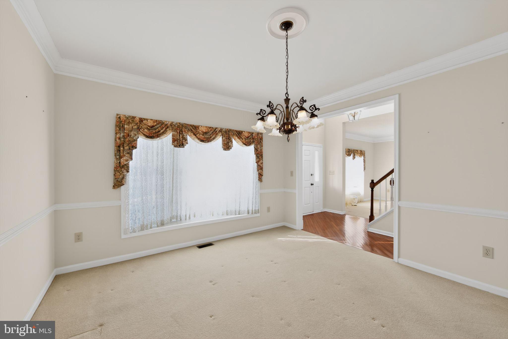 221 Cullen Way Newark, DE 19711 - Photo 12 of 37 a view of an empty room with a window