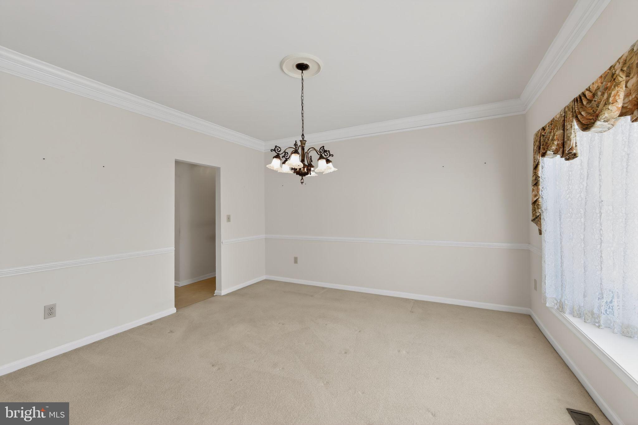 221 Cullen Way Newark, DE 19711 - Photo 4 of 37 wooden floor in an empty room with a window