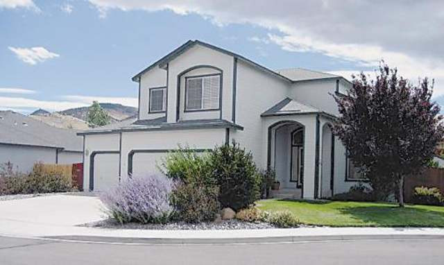 714 Gold Run Court Reno, NV 89521 - Photo 1 of 9 a front view of a house with garden