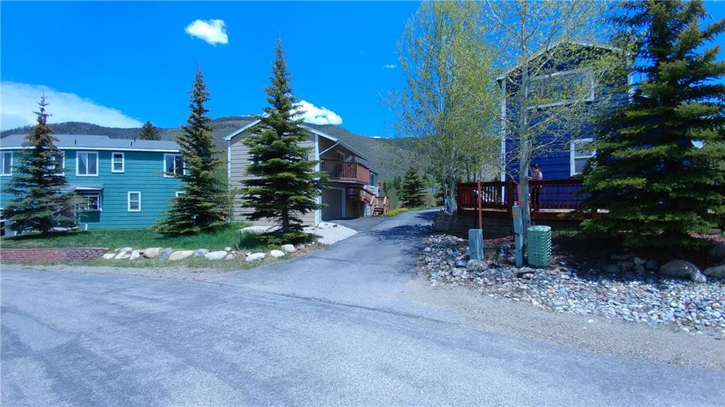 752 Alpine Road Dillon, CO 80435 - Photo 2 of 2 a view of a house with a yard and hanging chair