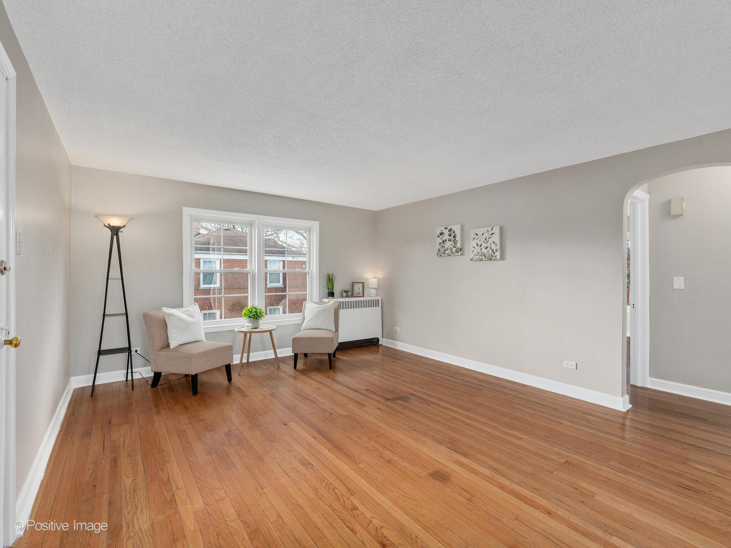 3505 Prairie Avenue, Unit 2W Brookfield, IL 60513 - Photo 2 of 11 a living room with furniture and a wooden floor