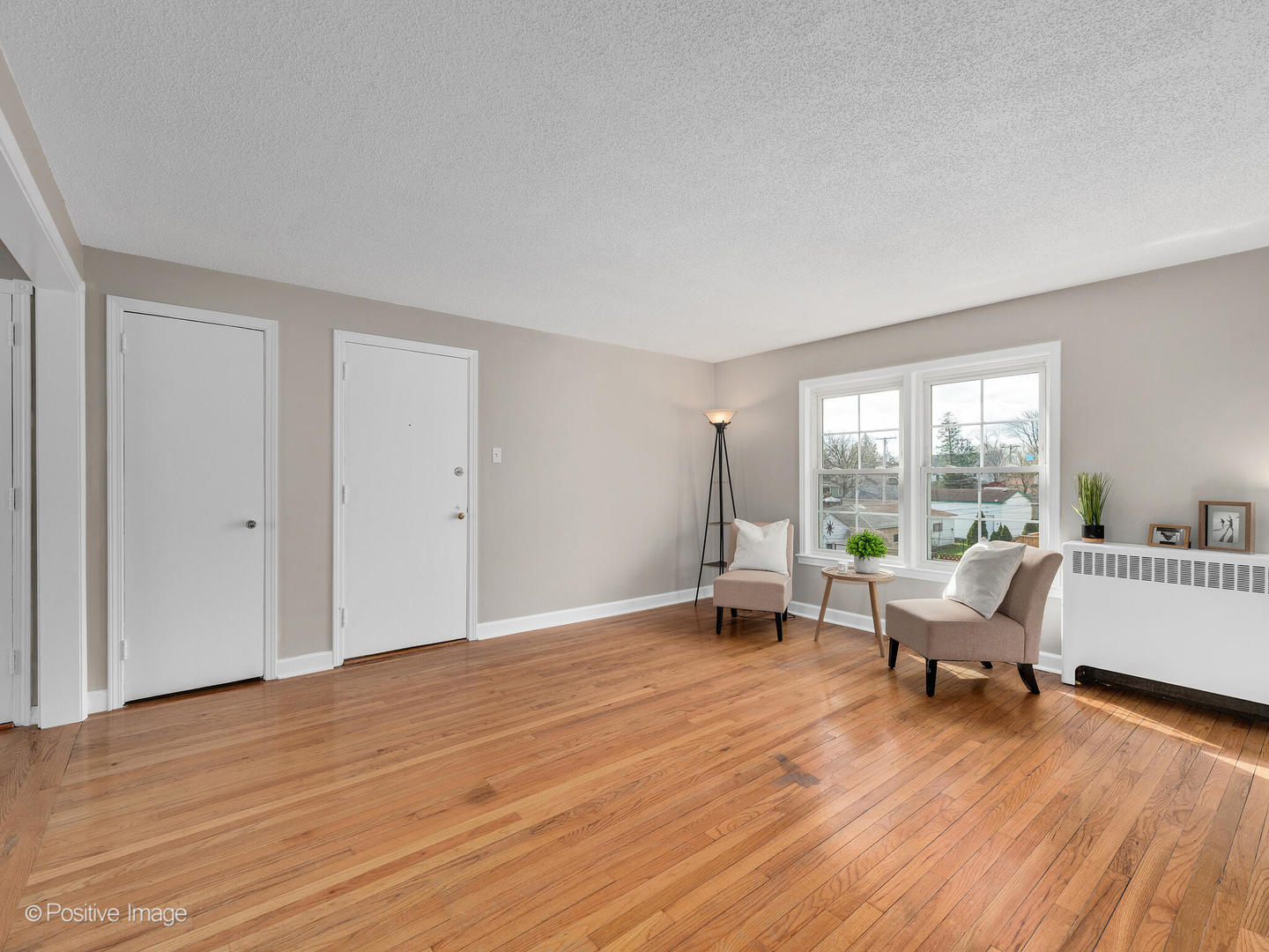 3505 Prairie Avenue, Unit 2W Brookfield, IL 60513 - Photo 3 of 11 a living room with furniture and wooden floor