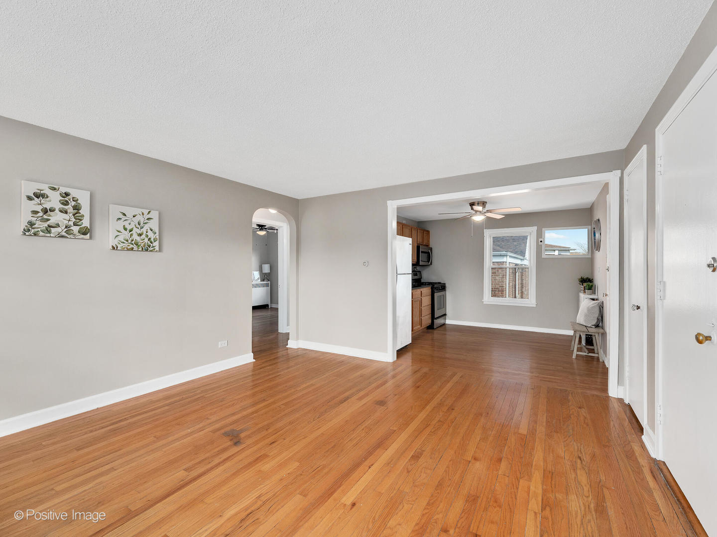 3505 Prairie Avenue, Unit 2W Brookfield, IL 60513 - Photo 4 of 11 a view of a big room with wooden floor and windows