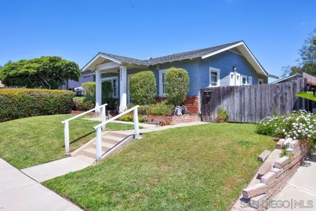 a house view with a garden space