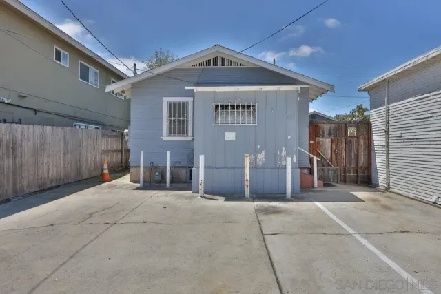 a front view of a house with a garage