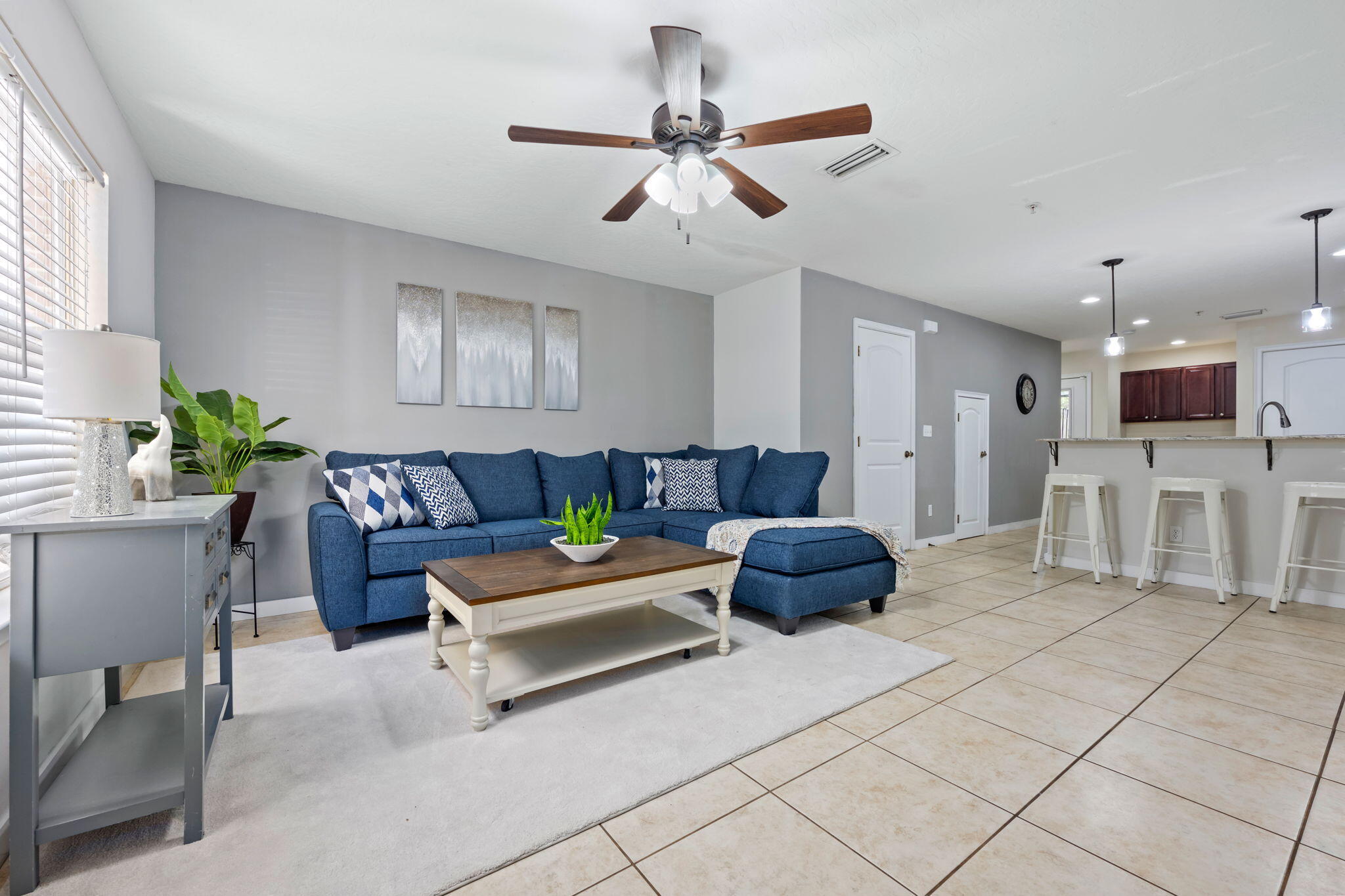 108 Hawkins Road, Unit E Fort Walton Beach, FL 32547 - Photo 1 of 41 a living room with furniture and a table