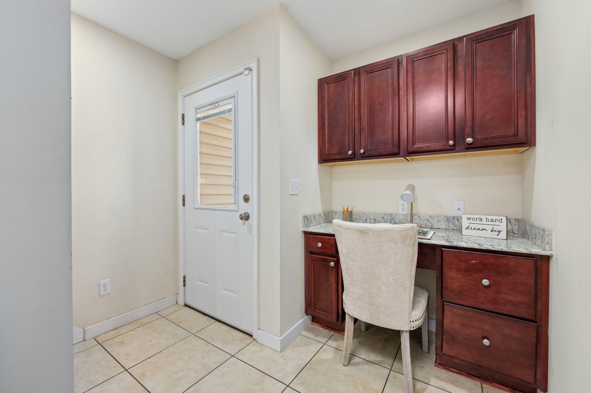 108 Hawkins Road, Unit E Fort Walton Beach, FL 32547 - Photo 12 of 41 a room with a cabinets and a window