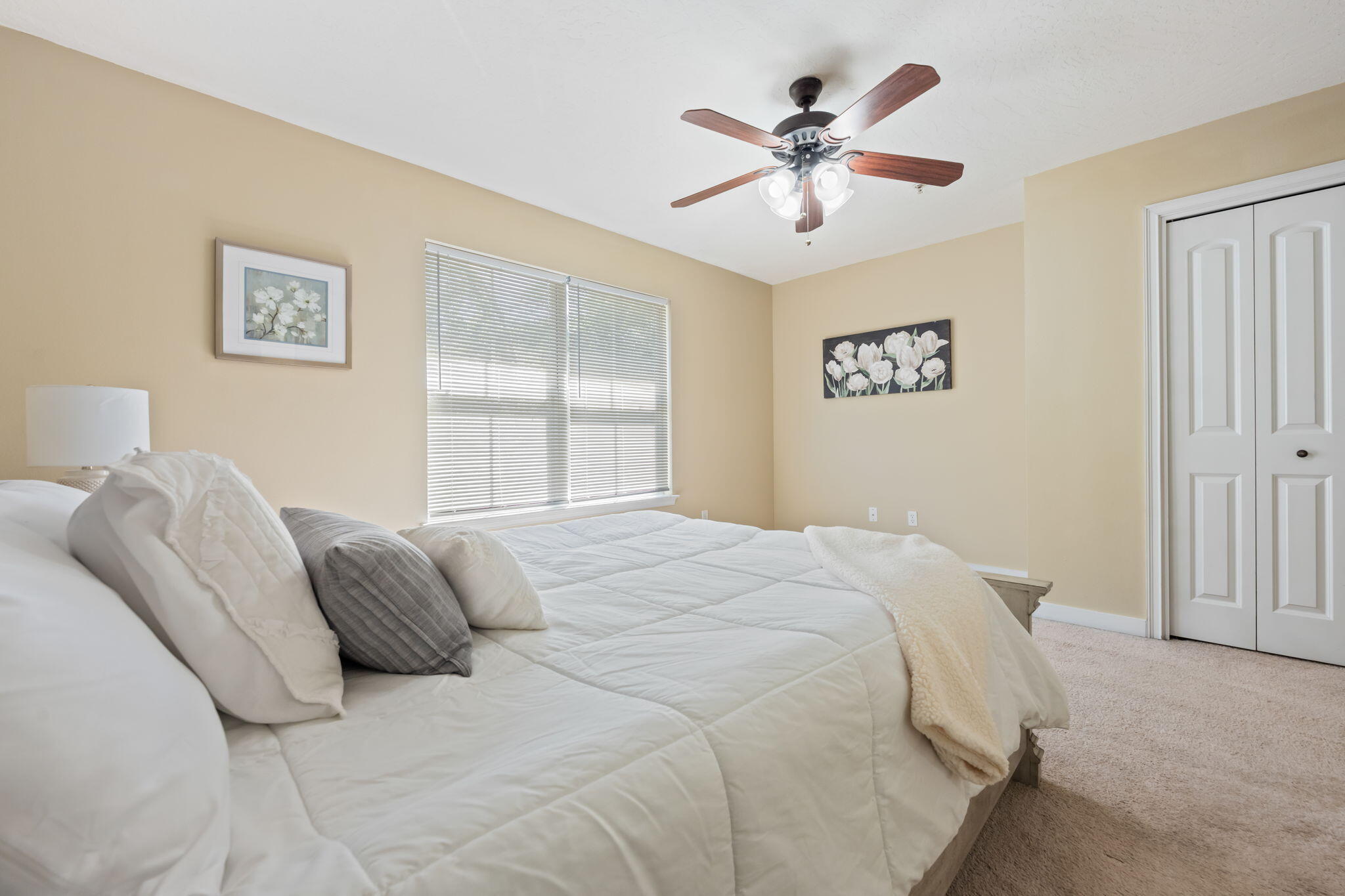 108 Hawkins Road, Unit E Fort Walton Beach, FL 32547 - Photo 24 of 41 a bedroom with a large bed and a window