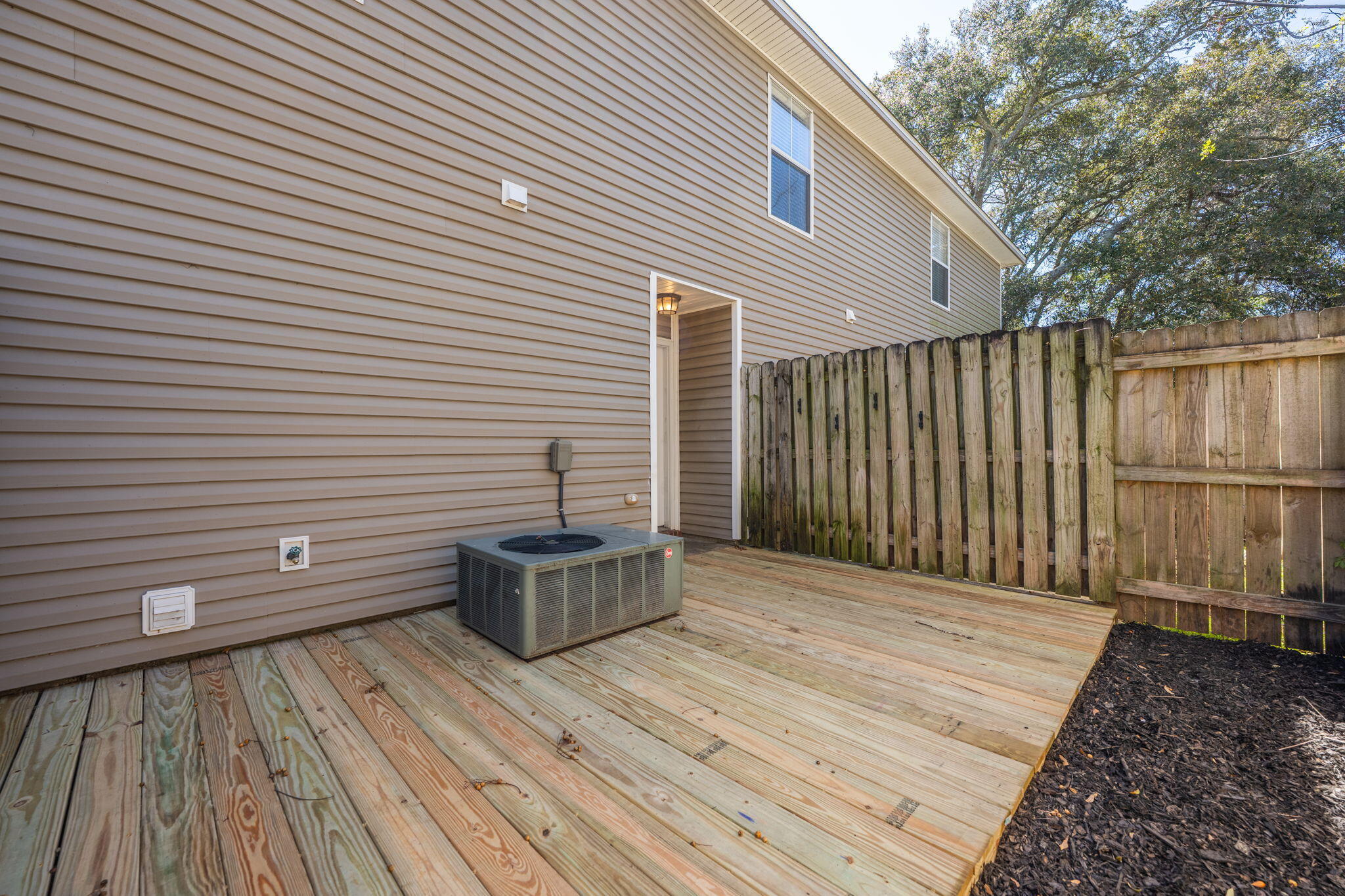 108 Hawkins Road, Unit E Fort Walton Beach, FL 32547 - Photo 34 of 41 a view of a wooden deck