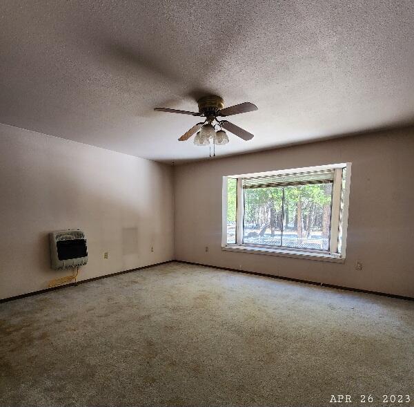 10385 Ritts Mill Road Shingletown, CA 96088 - Photo 16 of 29 an empty room with a ceiling fan and window