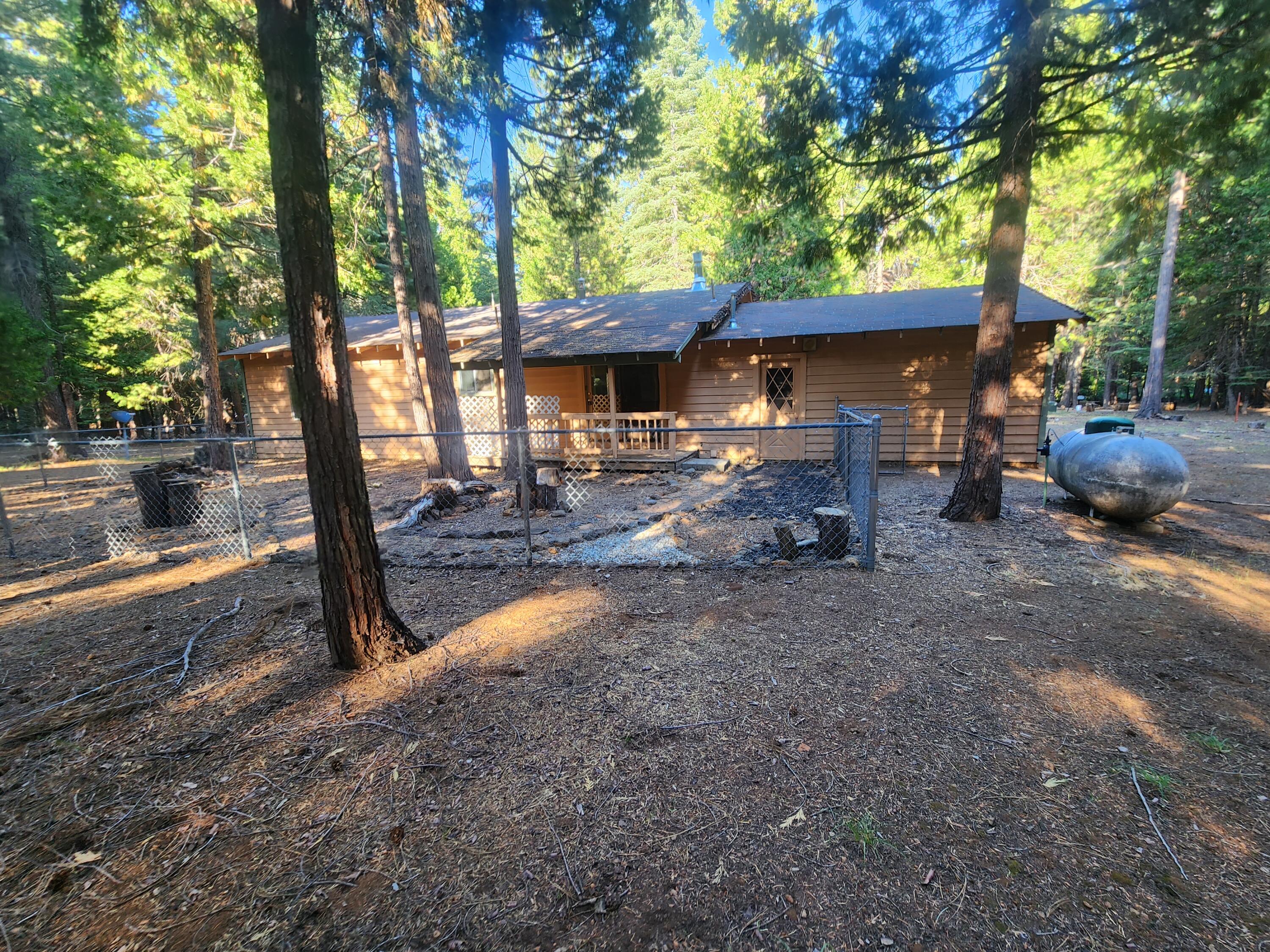 10385 Ritts Mill Road Shingletown, CA 96088 - Photo 27 of 29 a view of a house with backyard