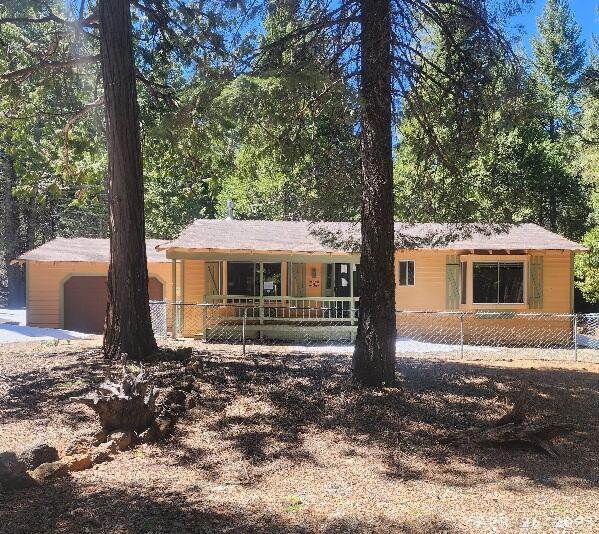 10385 Ritts Mill Road Shingletown, CA 96088 - Photo 4 of 29 a front view of a house with a yard
