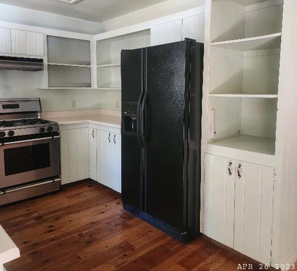 10385 Ritts Mill Road Shingletown, CA 96088 - Photo 7 of 29 a kitchen with a refrigerator and a stove